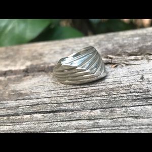 Unique Silver band ring with facets to catch light